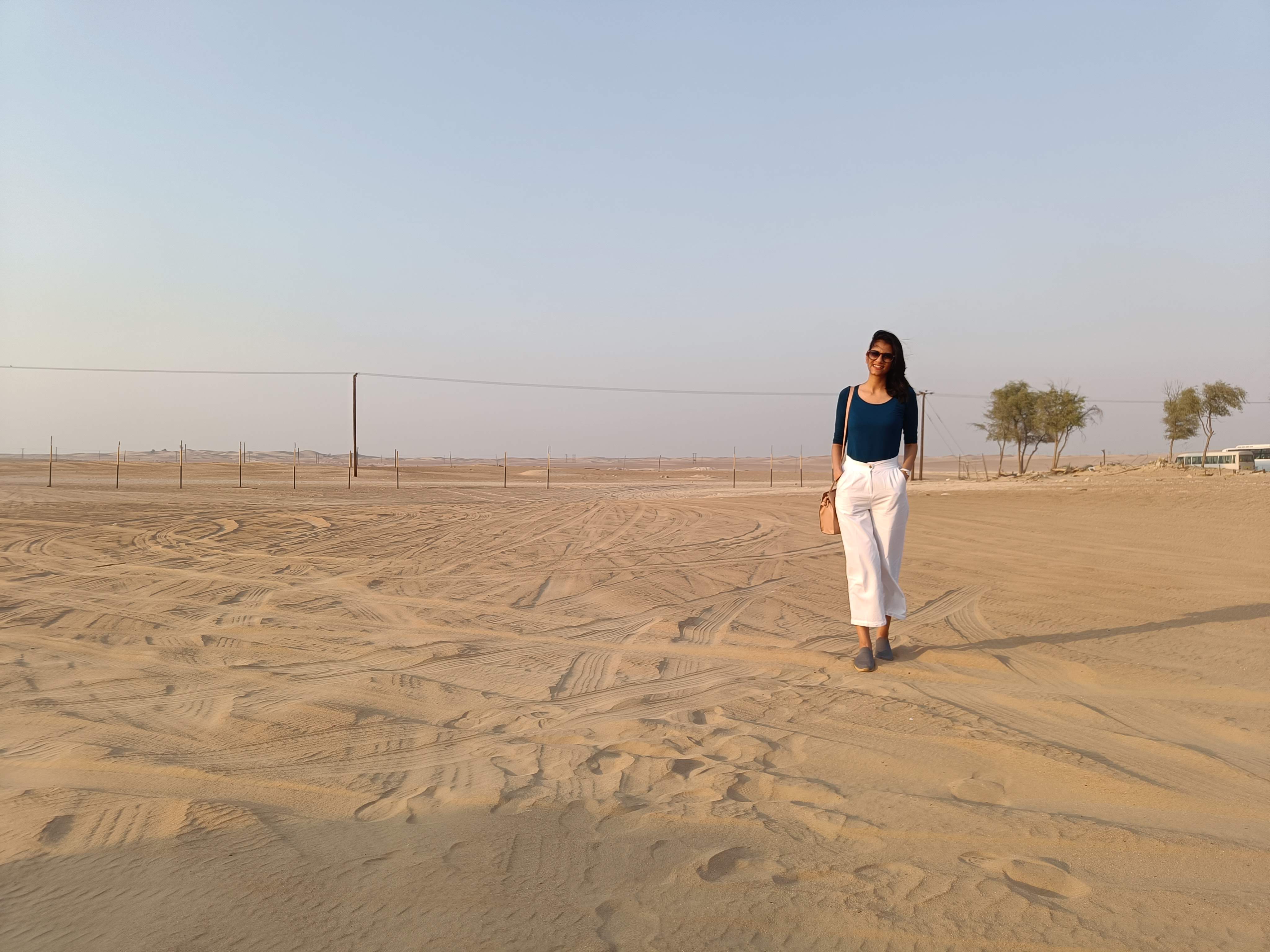 Dubai Desert Safari golden sand dunes - traditional Bedouin camp experience outside the city