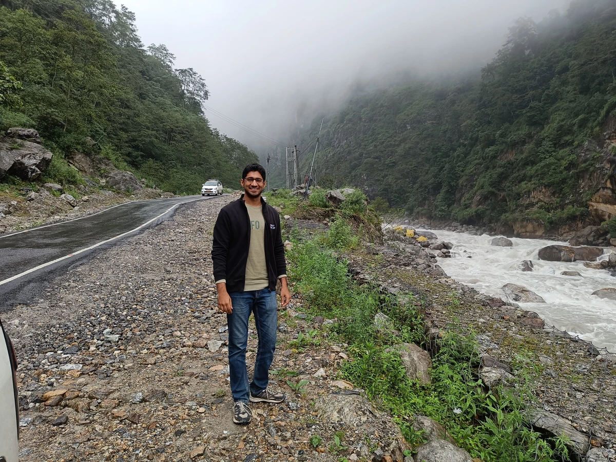 Roadside tea break by a mountain creek in North Sikkim