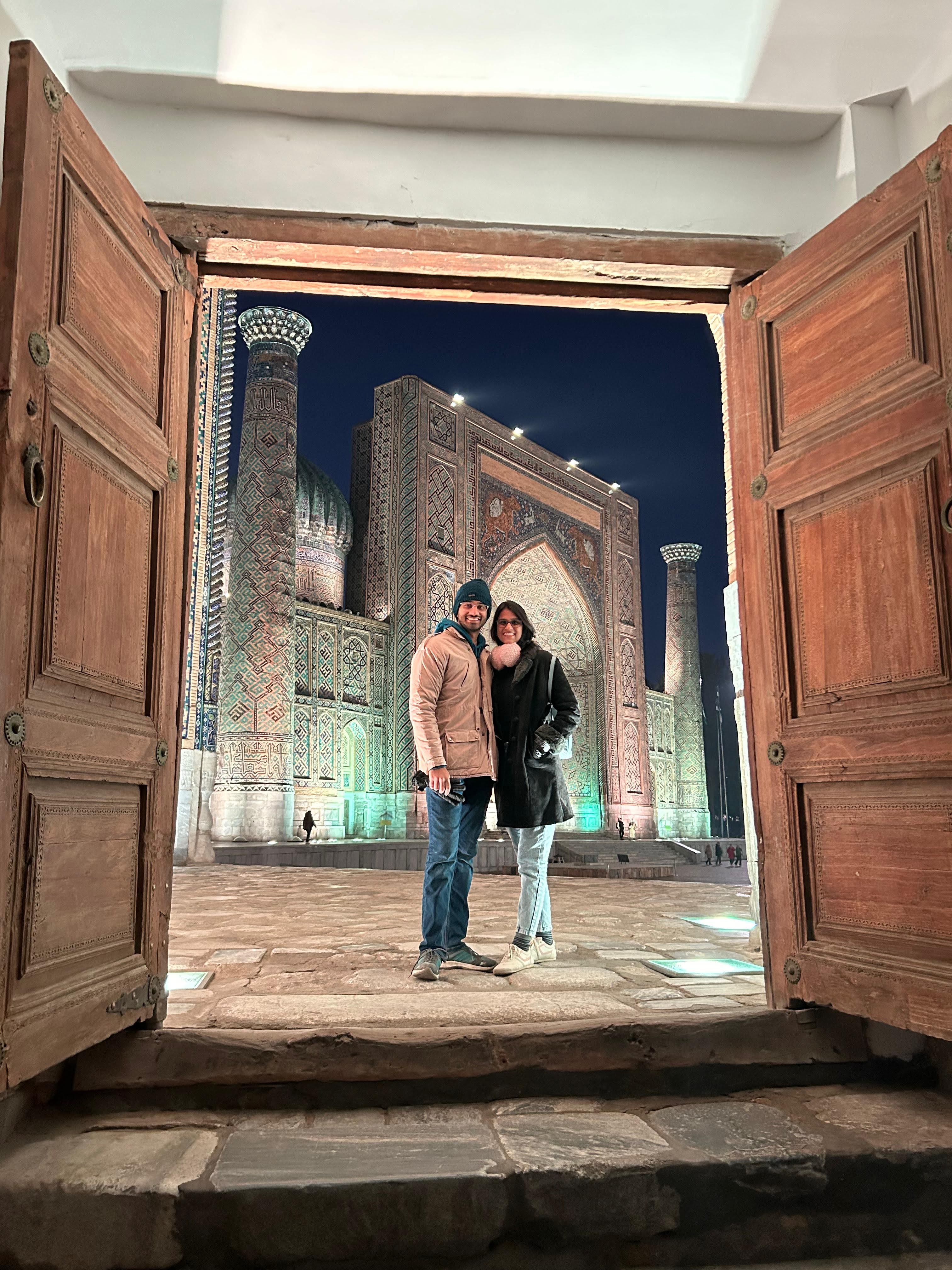 View of Sher-dor Madrasah from Ulugh Beg Madrasah in Registan Square, Samarkand - famous for its unique tiger motifs on the façade