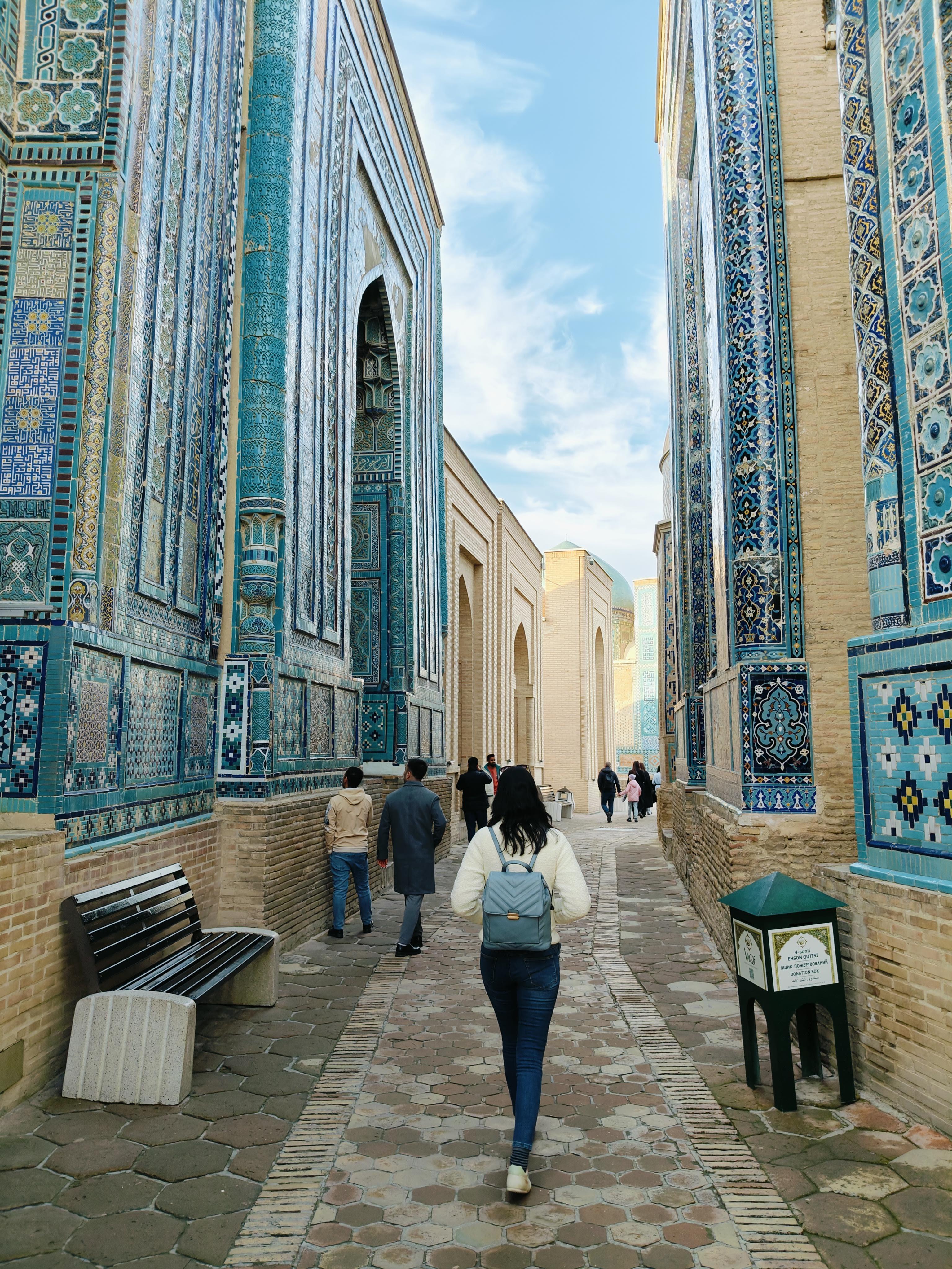 Historic 600-year-old mausoleums with brilliant blue tiles and Islamic architecture in Shah-i-Zinda necropolis complex, Samarkand, Uzbekistan