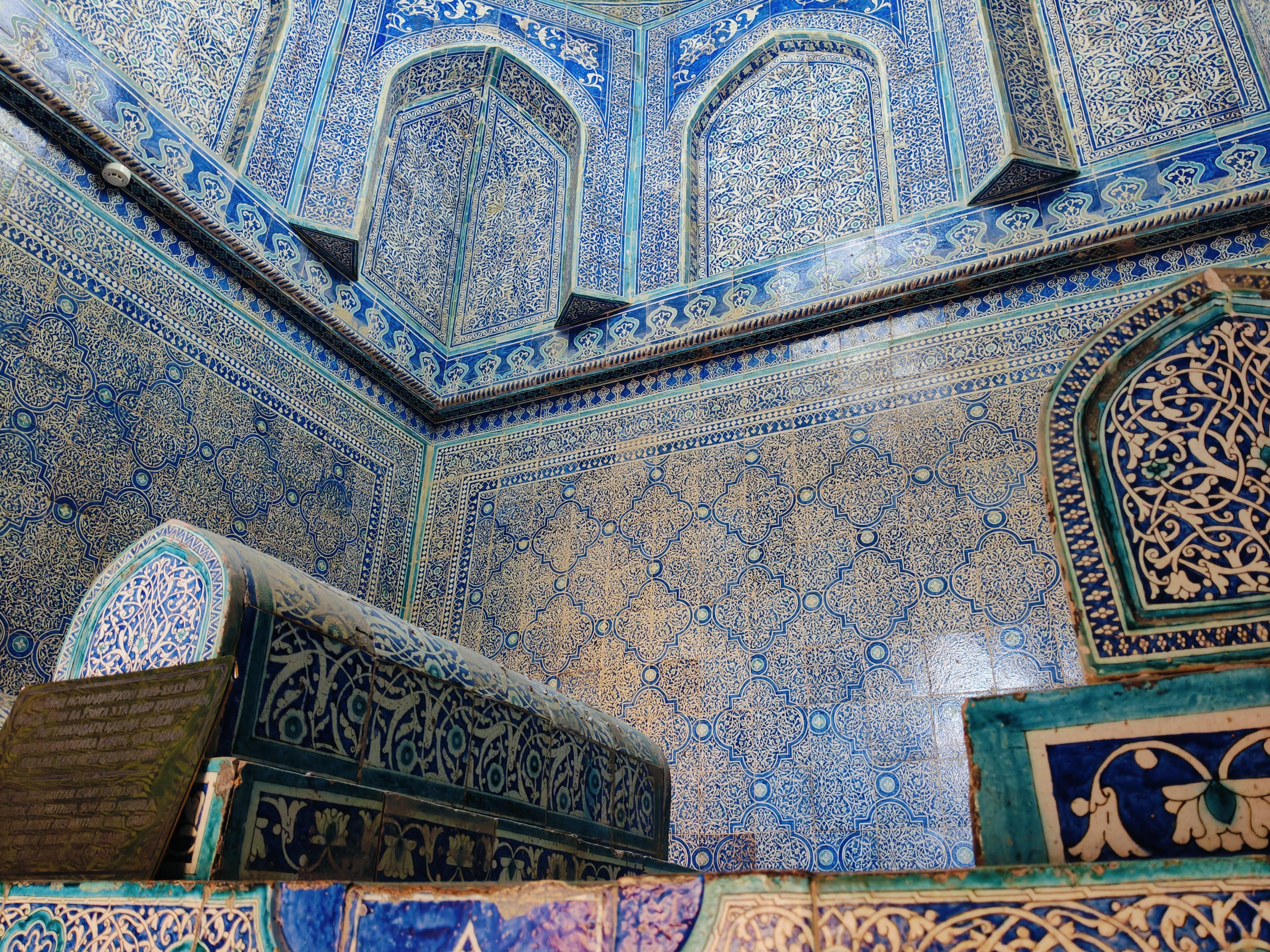 Ornate turquoise-tiled Pakhlavan Makhmud Mausoleum in Khiva - sacred site dedicated to Uzbekistan's patron saint and renowned 13th-century poet and wrestler