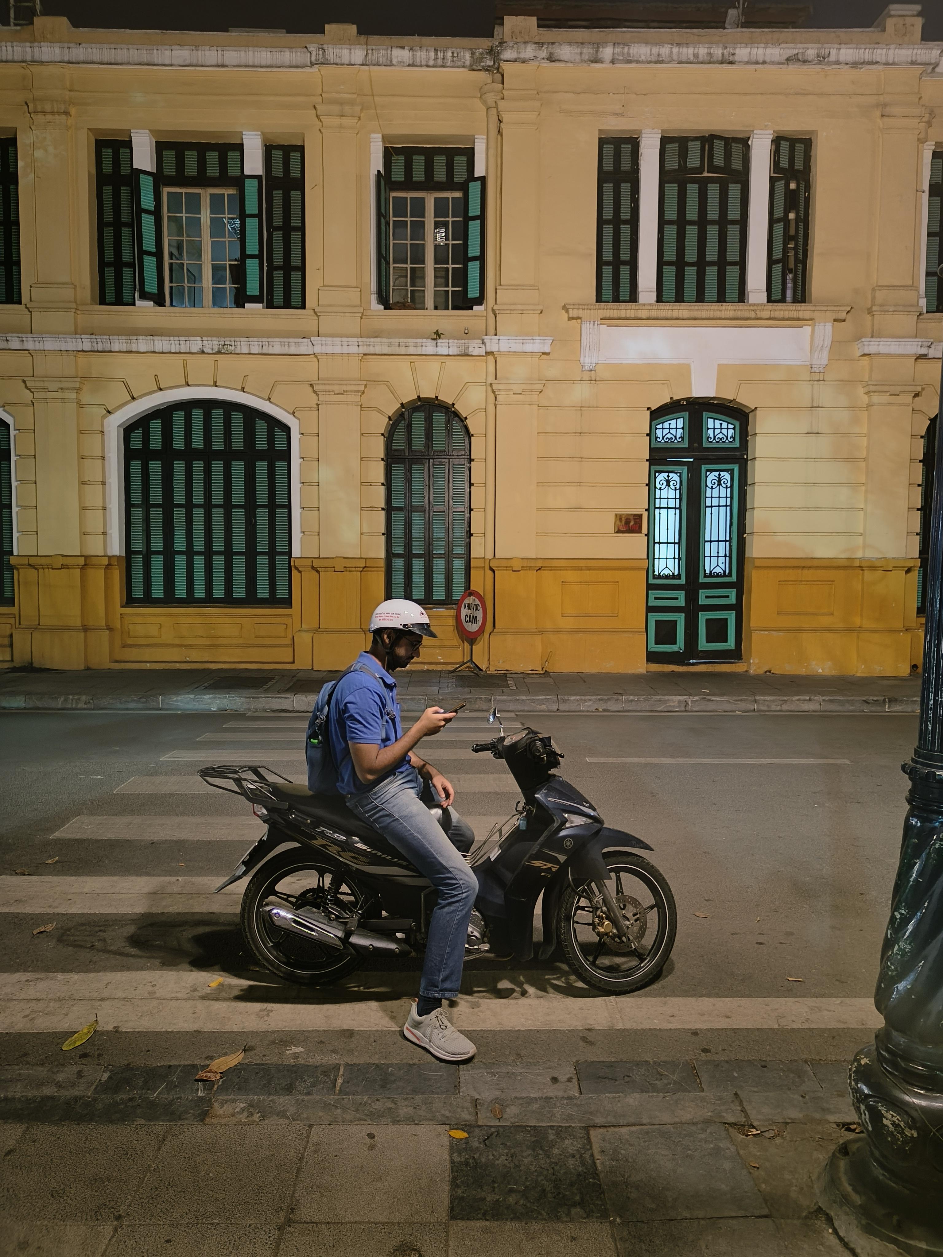 Hanoi's urban landscape showcasing traditional Vietnamese pagodas and modern buildings