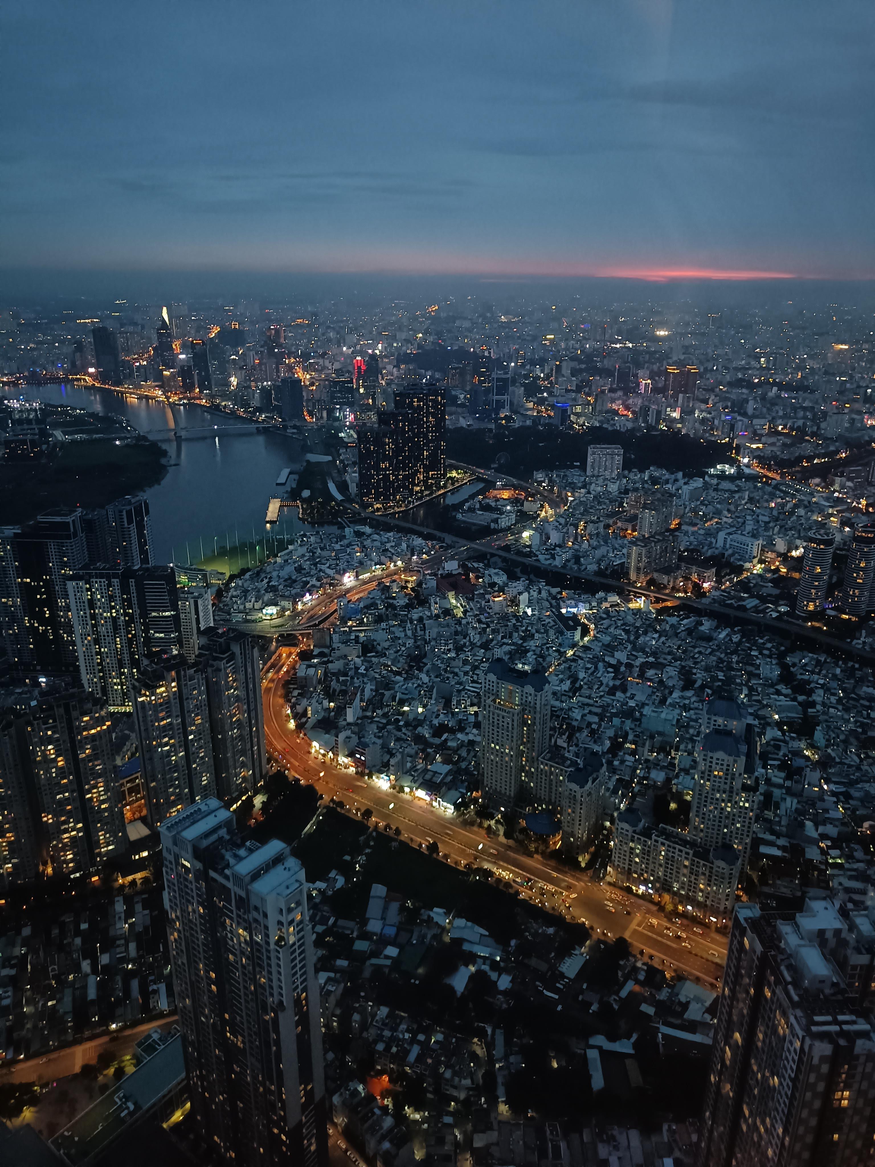 Panoramic sunset view of Ho Chi Minh City from high vantage point showing urban development in Vietnam